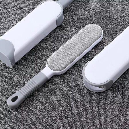 Reusable pet fur remover with self- cleaning base 